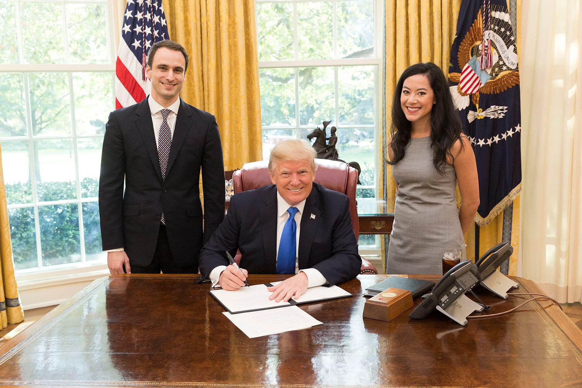 President Donald J. Trump is joined by Deputy Assistant to the President Michael Kratsios and Assistant Staff Secretary May Davis Mailman as he signs a Presidential Memo calling for a drone integration pilot program, at his desk in the Oval Office, Wednesday, Oct. 25, 2017, at the White House in Was. Control or influence in leadership: how to tell the honest instrument from the abuse