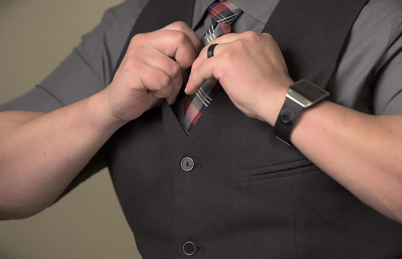 man, male, person, business, businessman, shirt, necktie, clothing, success, attractive, elegance, preparation, fashion, men, worker, lifestyle, confidence, hands, watch, adult, tie, style, white, wristwatch, modern, vest, black, wedding ring, gray business, gray fashion, gray wedding, gray clothes, gray company, gray watch, gray businessman, confidence, confidence, confidence, confidence, confidence, tie, vest. Executive communication techniques: rewriting a draft update one sentence at a time