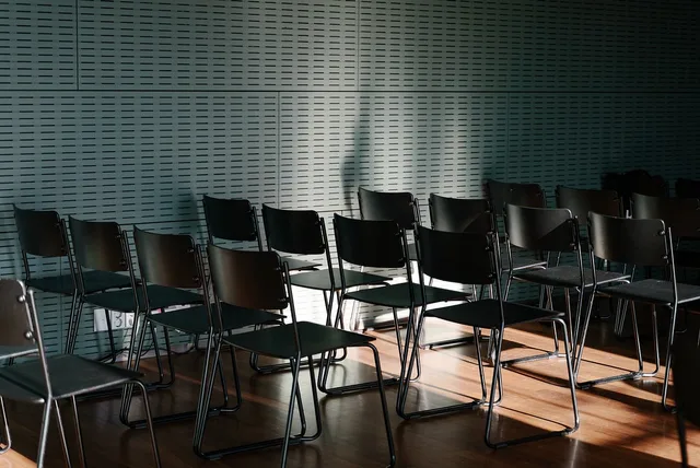 chair, room, furniture, seat, contrast, shadows, light, dark, office, meeting, conference, business. Spotting the stakeholder holes that cost a decision later