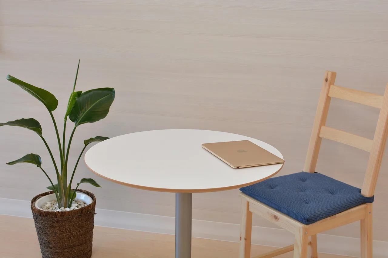 office, mac, macbook, table, chair, simple, simple, simple, simple, simple, simple. Workplace standing compared: earned, spent, or quietly wasted