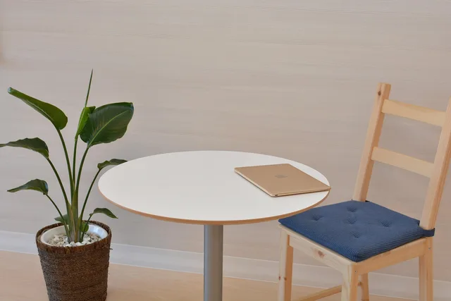office, mac, macbook, table, chair, simple, simple, simple, simple, simple, simple. Workplace standing compared: earned, spent, or quietly wasted